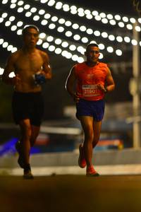 BIB: 21901
                            <button type="button" onclick="openModal(15616108)" class="btn btn-primary btn-sm float-right btn-popup" data-toggle="modal" data-target=".modal-high-quality">
                        <i class="fas fa-shopping-cart"></i> Add to Cart
                    </button>
                                            <button type="button" onclick="isThisMe(15616108, true)" class="btn btn-success btn-sm float-right btn-popup btn-isme hidden" data-toggle="tooltip" data-placement="bottom" title="นี่คือรูปของคุณใช่ไหม คลิกที่นี่เพื่อเอาเข้าอัลบั้ม">
                        <i class="fas fa-plus"></i> Add to album
                    </button>
                    <button type="button" onclick="isThisMe(15616108, false)" class="btn btn-warning btn-sm float-right btn-popup btn-isnotme hidden">
                        <i class="fas fa-ban"></i> Remove from album
                    </button>