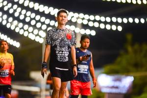 BIB: 21482
                            <button type="button" onclick="openModal(15711614)" class="btn btn-primary btn-sm float-right btn-popup" data-toggle="modal" data-target=".modal-high-quality">
                        <i class="fas fa-shopping-cart"></i> Add to Cart
                    </button>
                                            <button type="button" onclick="isThisMe(15711614, true)" class="btn btn-success btn-sm float-right btn-popup btn-isme hidden" data-toggle="tooltip" data-placement="bottom" title="นี่คือรูปของคุณใช่ไหม คลิกที่นี่เพื่อเอาเข้าอัลบั้ม">
                        <i class="fas fa-plus"></i> Add to album
                    </button>
                    <button type="button" onclick="isThisMe(15711614, false)" class="btn btn-warning btn-sm float-right btn-popup btn-isnotme hidden">
                        <i class="fas fa-ban"></i> Remove from album
                    </button>