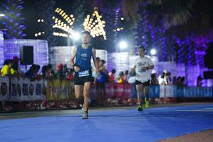 BIB: 45203
                            <button type="button" onclick="openModal(14075045)" class="btn btn-primary btn-sm float-right btn-popup" data-toggle="modal" data-target=".modal-high-quality">
                        <i class="fas fa-shopping-cart"></i> Add to Cart
                    </button>
                                            <button type="button" onclick="isThisMe(14075045, true)" class="btn btn-success btn-sm float-right btn-popup btn-isme hidden" data-toggle="tooltip" data-placement="bottom" title="นี่คือรูปของคุณใช่ไหม คลิกที่นี่เพื่อเอาเข้าอัลบั้ม">
                        <i class="fas fa-plus"></i> Add to album
                    </button>
                    <button type="button" onclick="isThisMe(14075045, false)" class="btn btn-warning btn-sm float-right btn-popup btn-isnotme hidden">
                        <i class="fas fa-ban"></i> Remove from album
                    </button>