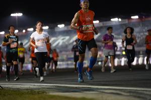 BIB: 143
                            <button type="button" onclick="openModal(13887583)" class="btn btn-primary btn-sm float-right btn-popup" data-toggle="modal" data-target=".modal-high-quality">
                        <i class="fas fa-shopping-cart"></i> Add to Cart
                    </button>
                                            <button type="button" onclick="isThisMe(13887583, true)" class="btn btn-success btn-sm float-right btn-popup btn-isme hidden" data-toggle="tooltip" data-placement="bottom" title="นี่คือรูปของคุณใช่ไหม คลิกที่นี่เพื่อเอาเข้าอัลบั้ม">
                        <i class="fas fa-plus"></i> Add to album
                    </button>
                    <button type="button" onclick="isThisMe(13887583, false)" class="btn btn-warning btn-sm float-right btn-popup btn-isnotme hidden">
                        <i class="fas fa-ban"></i> Remove from album
                    </button>