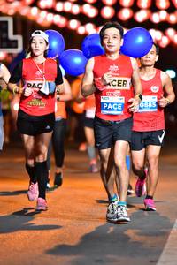 BIB: 0885
                            <button type="button" onclick="openModal(14369804)" class="btn btn-primary btn-sm float-right btn-popup" data-toggle="modal" data-target=".modal-high-quality">
                        <i class="fas fa-shopping-cart"></i> Add to Cart
                    </button>
                                            <button type="button" onclick="isThisMe(14369804, true)" class="btn btn-success btn-sm float-right btn-popup btn-isme hidden" data-toggle="tooltip" data-placement="bottom" title="นี่คือรูปของคุณใช่ไหม คลิกที่นี่เพื่อเอาเข้าอัลบั้ม">
                        <i class="fas fa-plus"></i> Add to album
                    </button>
                    <button type="button" onclick="isThisMe(14369804, false)" class="btn btn-warning btn-sm float-right btn-popup btn-isnotme hidden">
                        <i class="fas fa-ban"></i> Remove from album
                    </button>