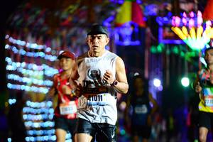 BIB: 41011
                            <button type="button" onclick="openModal(16133114)" class="btn btn-primary btn-sm float-right btn-popup" data-toggle="modal" data-target=".modal-high-quality">
                        <i class="fas fa-shopping-cart"></i> Add to Cart
                    </button>
                                            <button type="button" onclick="isThisMe(16133114, true)" class="btn btn-success btn-sm float-right btn-popup btn-isme hidden" data-toggle="tooltip" data-placement="bottom" title="นี่คือรูปของคุณใช่ไหม คลิกที่นี่เพื่อเอาเข้าอัลบั้ม">
                        <i class="fas fa-plus"></i> Add to album
                    </button>
                    <button type="button" onclick="isThisMe(16133114, false)" class="btn btn-warning btn-sm float-right btn-popup btn-isnotme hidden">
                        <i class="fas fa-ban"></i> Remove from album
                    </button>