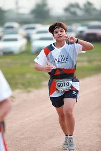 BIB: 6010
                            <button type="button" onclick="openModal(6369699)" class="btn btn-primary btn-sm float-right btn-popup" data-toggle="modal" data-target=".modal-high-quality">
                        <i class="fas fa-shopping-cart"></i> Add to Cart
                    </button>
                                            <button type="button" onclick="isThisMe(6369699, true)" class="btn btn-success btn-sm float-right btn-popup btn-isme hidden" data-toggle="tooltip" data-placement="bottom" title="นี่คือรูปของคุณใช่ไหม คลิกที่นี่เพื่อเอาเข้าอัลบั้ม">
                        <i class="fas fa-plus"></i> Add to album
                    </button>
                    <button type="button" onclick="isThisMe(6369699, false)" class="btn btn-warning btn-sm float-right btn-popup btn-isnotme hidden">
                        <i class="fas fa-ban"></i> Remove from album
                    </button>