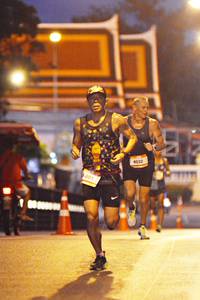 BIB: 4032, 801
                            <button type="button" onclick="openModal(13157547)" class="btn btn-primary btn-sm float-right btn-popup" data-toggle="modal" data-target=".modal-high-quality">
                        <i class="fas fa-shopping-cart"></i> Add to Cart
                    </button>
                                            <button type="button" onclick="isThisMe(13157547, true)" class="btn btn-success btn-sm float-right btn-popup btn-isme hidden" data-toggle="tooltip" data-placement="bottom" title="นี่คือรูปของคุณใช่ไหม คลิกที่นี่เพื่อเอาเข้าอัลบั้ม">
                        <i class="fas fa-plus"></i> Add to album
                    </button>
                    <button type="button" onclick="isThisMe(13157547, false)" class="btn btn-warning btn-sm float-right btn-popup btn-isnotme hidden">
                        <i class="fas fa-ban"></i> Remove from album
                    </button>