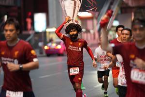 BIB: 132, 2164
                            <button type="button" onclick="openModal(5865657)" class="btn btn-primary btn-sm float-right btn-popup" data-toggle="modal" data-target=".modal-high-quality">
                        <i class="fas fa-shopping-cart"></i> Add to Cart
                    </button>
                                            <button type="button" onclick="isThisMe(5865657, true)" class="btn btn-success btn-sm float-right btn-popup btn-isme hidden" data-toggle="tooltip" data-placement="bottom" title="นี่คือรูปของคุณใช่ไหม คลิกที่นี่เพื่อเอาเข้าอัลบั้ม">
                        <i class="fas fa-plus"></i> Add to album
                    </button>
                    <button type="button" onclick="isThisMe(5865657, false)" class="btn btn-warning btn-sm float-right btn-popup btn-isnotme hidden">
                        <i class="fas fa-ban"></i> Remove from album
                    </button>