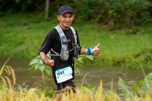 BIB: 1592
                            <button type="button" onclick="openModal(13493089)" class="btn btn-primary btn-sm float-right btn-popup" data-toggle="modal" data-target=".modal-high-quality">
                        <i class="fas fa-shopping-cart"></i> Add to Cart
                    </button>
                                            <button type="button" onclick="isThisMe(13493089, true)" class="btn btn-success btn-sm float-right btn-popup btn-isme hidden" data-toggle="tooltip" data-placement="bottom" title="นี่คือรูปของคุณใช่ไหม คลิกที่นี่เพื่อเอาเข้าอัลบั้ม">
                        <i class="fas fa-plus"></i> Add to album
                    </button>
                    <button type="button" onclick="isThisMe(13493089, false)" class="btn btn-warning btn-sm float-right btn-popup btn-isnotme hidden">
                        <i class="fas fa-ban"></i> Remove from album
                    </button>