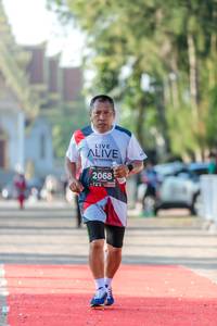 BIB: 2068
                            <button type="button" onclick="openModal(6560044)" class="btn btn-primary btn-sm float-right btn-popup" data-toggle="modal" data-target=".modal-high-quality">
                        <i class="fas fa-shopping-cart"></i> Add to Cart
                    </button>
                                            <button type="button" onclick="isThisMe(6560044, true)" class="btn btn-success btn-sm float-right btn-popup btn-isme hidden" data-toggle="tooltip" data-placement="bottom" title="นี่คือรูปของคุณใช่ไหม คลิกที่นี่เพื่อเอาเข้าอัลบั้ม">
                        <i class="fas fa-plus"></i> Add to album
                    </button>
                    <button type="button" onclick="isThisMe(6560044, false)" class="btn btn-warning btn-sm float-right btn-popup btn-isnotme hidden">
                        <i class="fas fa-ban"></i> Remove from album
                    </button>