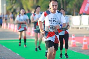 BIB: 6687
                            <button type="button" onclick="openModal(6502120)" class="btn btn-primary btn-sm float-right btn-popup" data-toggle="modal" data-target=".modal-high-quality">
                        <i class="fas fa-shopping-cart"></i> Add to Cart
                    </button>
                                            <button type="button" onclick="isThisMe(6502120, true)" class="btn btn-success btn-sm float-right btn-popup btn-isme hidden" data-toggle="tooltip" data-placement="bottom" title="นี่คือรูปของคุณใช่ไหม คลิกที่นี่เพื่อเอาเข้าอัลบั้ม">
                        <i class="fas fa-plus"></i> Add to album
                    </button>
                    <button type="button" onclick="isThisMe(6502120, false)" class="btn btn-warning btn-sm float-right btn-popup btn-isnotme hidden">
                        <i class="fas fa-ban"></i> Remove from album
                    </button>