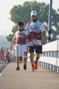 BIB: 6270
                            <button type="button" onclick="openModal(6421461)" class="btn btn-primary btn-sm float-right btn-popup" data-toggle="modal" data-target=".modal-high-quality">
                        <i class="fas fa-shopping-cart"></i> Add to Cart
                    </button>
                                            <button type="button" onclick="isThisMe(6421461, true)" class="btn btn-success btn-sm float-right btn-popup btn-isme hidden" data-toggle="tooltip" data-placement="bottom" title="นี่คือรูปของคุณใช่ไหม คลิกที่นี่เพื่อเอาเข้าอัลบั้ม">
                        <i class="fas fa-plus"></i> Add to album
                    </button>
                    <button type="button" onclick="isThisMe(6421461, false)" class="btn btn-warning btn-sm float-right btn-popup btn-isnotme hidden">
                        <i class="fas fa-ban"></i> Remove from album
                    </button>