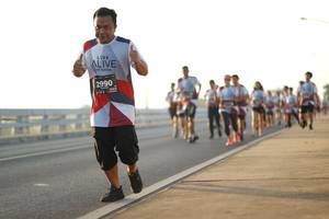 BIB: 2990
                            <button type="button" onclick="openModal(6444678)" class="btn btn-primary btn-sm float-right btn-popup" data-toggle="modal" data-target=".modal-high-quality">
                        <i class="fas fa-shopping-cart"></i> Add to Cart
                    </button>
                                            <button type="button" onclick="isThisMe(6444678, true)" class="btn btn-success btn-sm float-right btn-popup btn-isme hidden" data-toggle="tooltip" data-placement="bottom" title="นี่คือรูปของคุณใช่ไหม คลิกที่นี่เพื่อเอาเข้าอัลบั้ม">
                        <i class="fas fa-plus"></i> Add to album
                    </button>
                    <button type="button" onclick="isThisMe(6444678, false)" class="btn btn-warning btn-sm float-right btn-popup btn-isnotme hidden">
                        <i class="fas fa-ban"></i> Remove from album
                    </button>