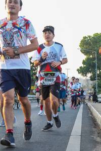 BIB: 6969
                            <button type="button" onclick="openModal(6424605)" class="btn btn-primary btn-sm float-right btn-popup" data-toggle="modal" data-target=".modal-high-quality">
                        <i class="fas fa-shopping-cart"></i> Add to Cart
                    </button>
                                            <button type="button" onclick="isThisMe(6424605, true)" class="btn btn-success btn-sm float-right btn-popup btn-isme hidden" data-toggle="tooltip" data-placement="bottom" title="นี่คือรูปของคุณใช่ไหม คลิกที่นี่เพื่อเอาเข้าอัลบั้ม">
                        <i class="fas fa-plus"></i> Add to album
                    </button>
                    <button type="button" onclick="isThisMe(6424605, false)" class="btn btn-warning btn-sm float-right btn-popup btn-isnotme hidden">
                        <i class="fas fa-ban"></i> Remove from album
                    </button>