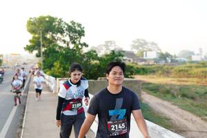 BIB: 2189, 2145
                            <button type="button" onclick="openModal(6406689)" class="btn btn-primary btn-sm float-right btn-popup" data-toggle="modal" data-target=".modal-high-quality">
                        <i class="fas fa-shopping-cart"></i> Add to Cart
                    </button>
                                            <button type="button" onclick="isThisMe(6406689, true)" class="btn btn-success btn-sm float-right btn-popup btn-isme hidden" data-toggle="tooltip" data-placement="bottom" title="นี่คือรูปของคุณใช่ไหม คลิกที่นี่เพื่อเอาเข้าอัลบั้ม">
                        <i class="fas fa-plus"></i> Add to album
                    </button>
                    <button type="button" onclick="isThisMe(6406689, false)" class="btn btn-warning btn-sm float-right btn-popup btn-isnotme hidden">
                        <i class="fas fa-ban"></i> Remove from album
                    </button>