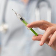 Syringe, medical injection in hand. Vaccination equipment with needle.