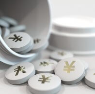 Close-up shot of pills with stamped yen symbol on them. Expensive drugs or financial remedy conceptual 3D rendering