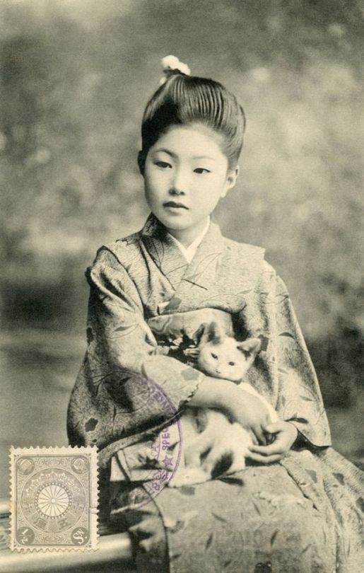 ねこと写真を撮る昔の日本人。 