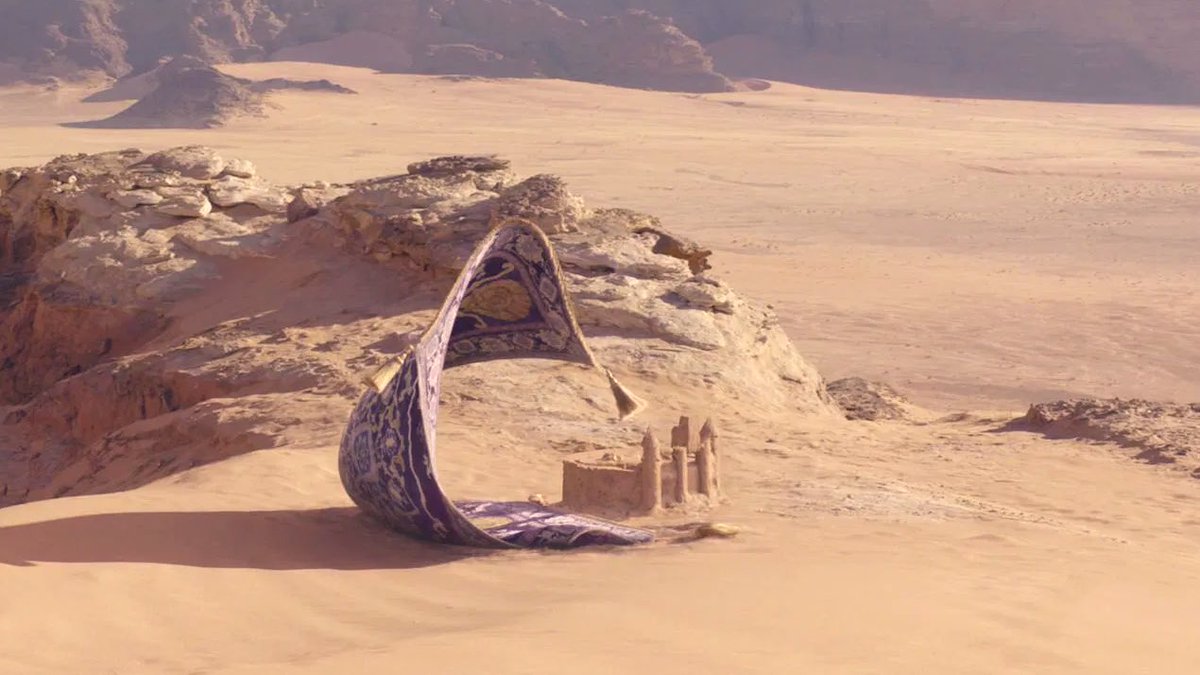 アラジンとジーニーが砂漠で話してるシーンの魔法の絨毯、座り込んで何してるんだろう