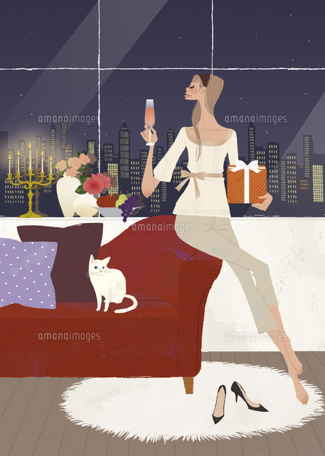 クリスマスパーティを猫と一緒に楽しむ女性
(c)Yuko Yoshioka