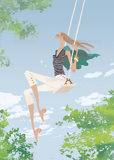 初夏の青空の下でブランコを楽しむ女性
(c)Yuko Yoshioka