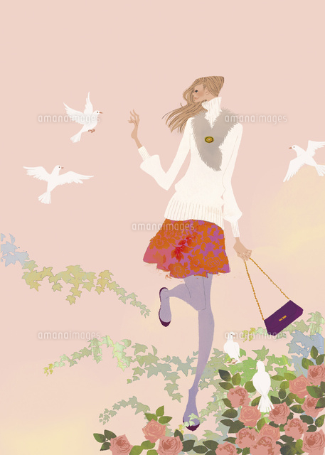 春の花の中で鳥と戯れる女性
(c)Yuko Yoshioka