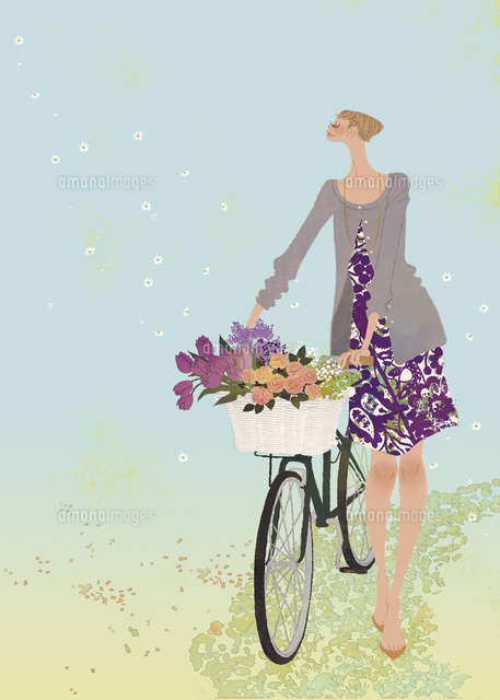 カゴに花束を乗せた自転車を押す女性
(c)Yuko Yoshioka