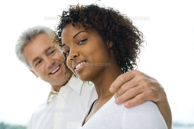 Man with arm around woman’s shoulder
(c)Laurence Mouton/Photo Alto