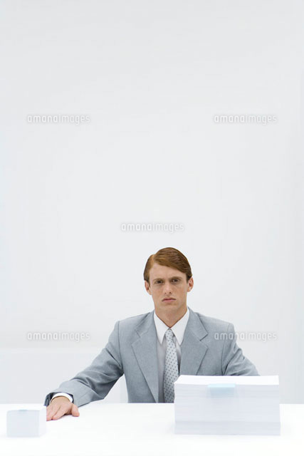 Businessman sitting at table
(c)Alix Minde/PhotoAlto