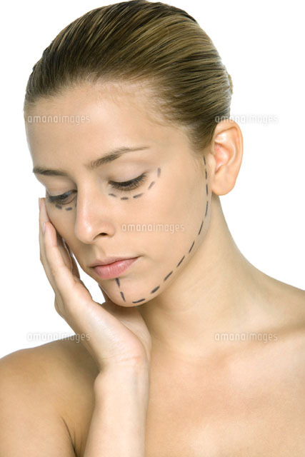 Woman with plastic surgery markings on face
(c)Alix Minde/PhotoAlto