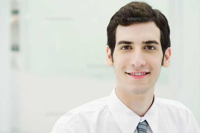 Young businessman smiling at camera,portrait
(c)Eric Audras/PhotoAlto