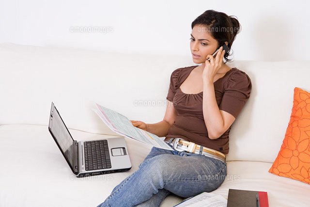 A woman sorting out her finances
(c)Image Source