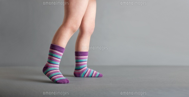 Child wearing striped socks
(c)Image Source