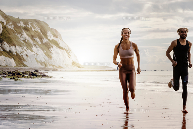 running barefoot on beach