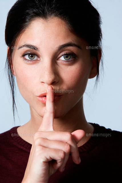 Young woman with finger over mouth
(c)clover/a.collectionRF