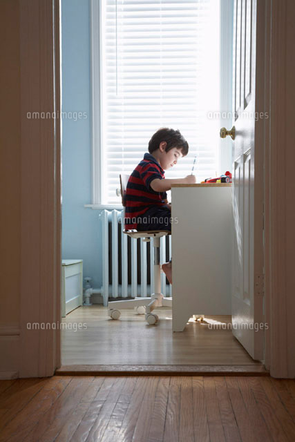 Boy at Desk in Bedroom
(c)Radius Images