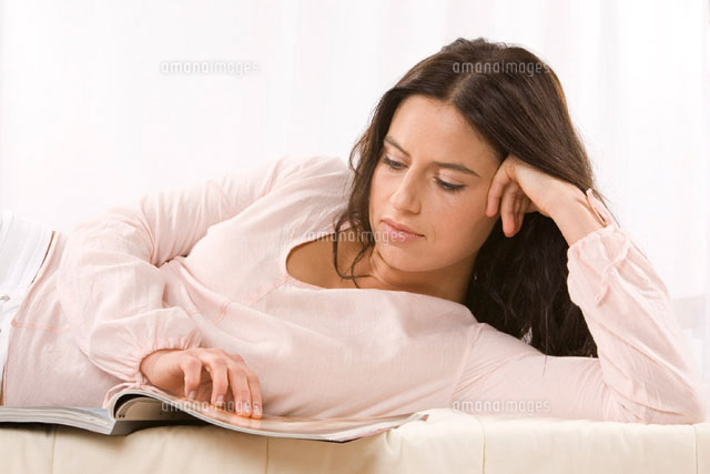 Woman Reading Magazine
(c)Radius Images
