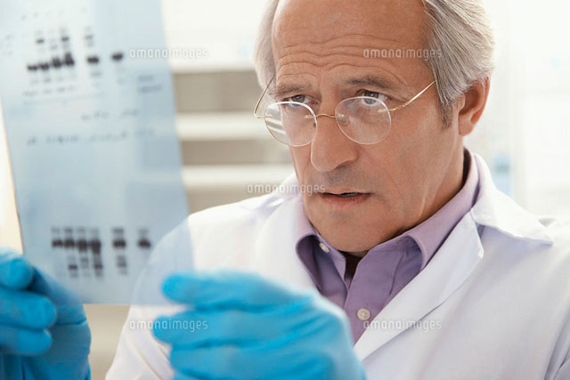 Scientist looking at DNA test results indoors
(c)moodboard