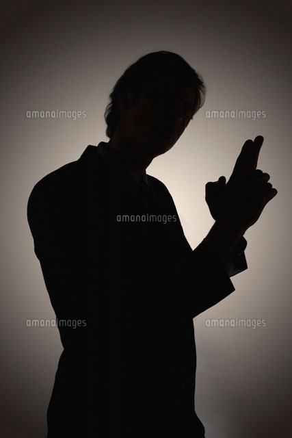 Shadow of man making gun-shaped gesture side view
(c)moodboard