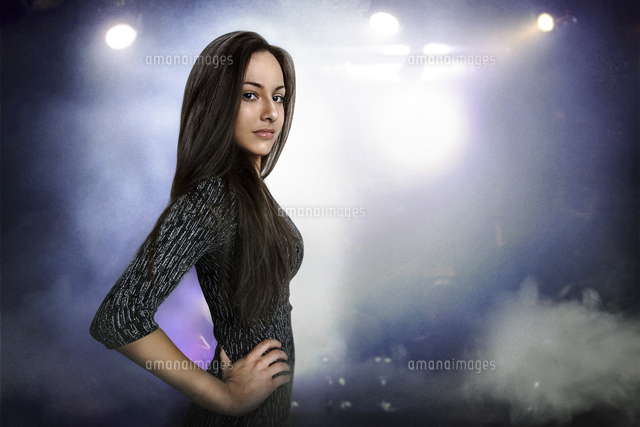 Portrait of beautiful young woman posing in nightclub
(c)moodboard