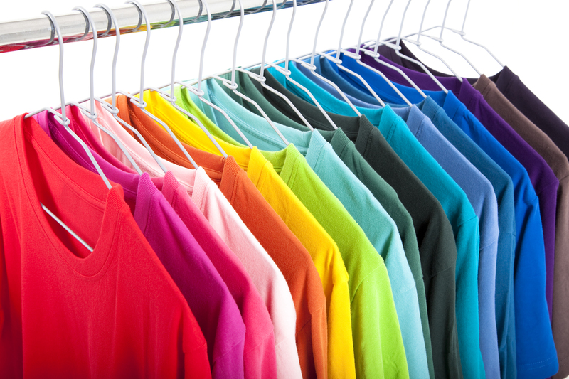 Variety of casual shirts on hangers