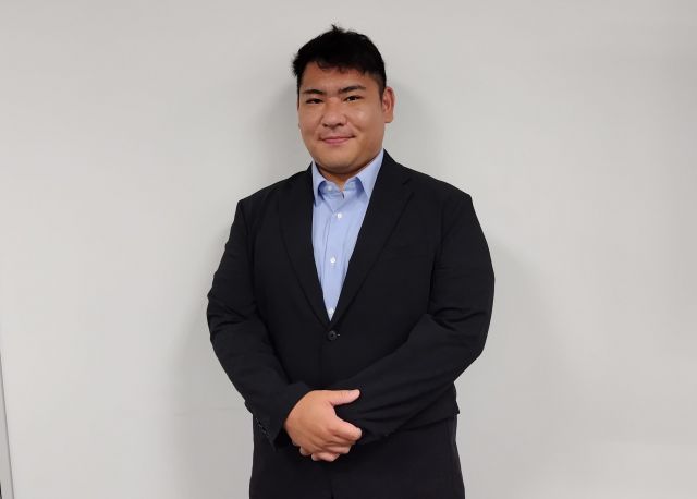 職場での堀口さん