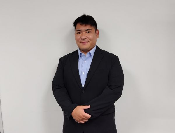 職場の堀口さん