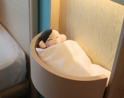 専用の布団で眠るぬいぐるみ