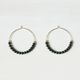 black beads pierce