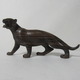 33．バリ島の虎（黒檀材）　　　　　　　　　　　　（幅23×奥行6.5×高さ11.5cm）