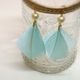 Spring feather pierce