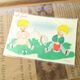 男の子と女の子 芝生 ポストカード