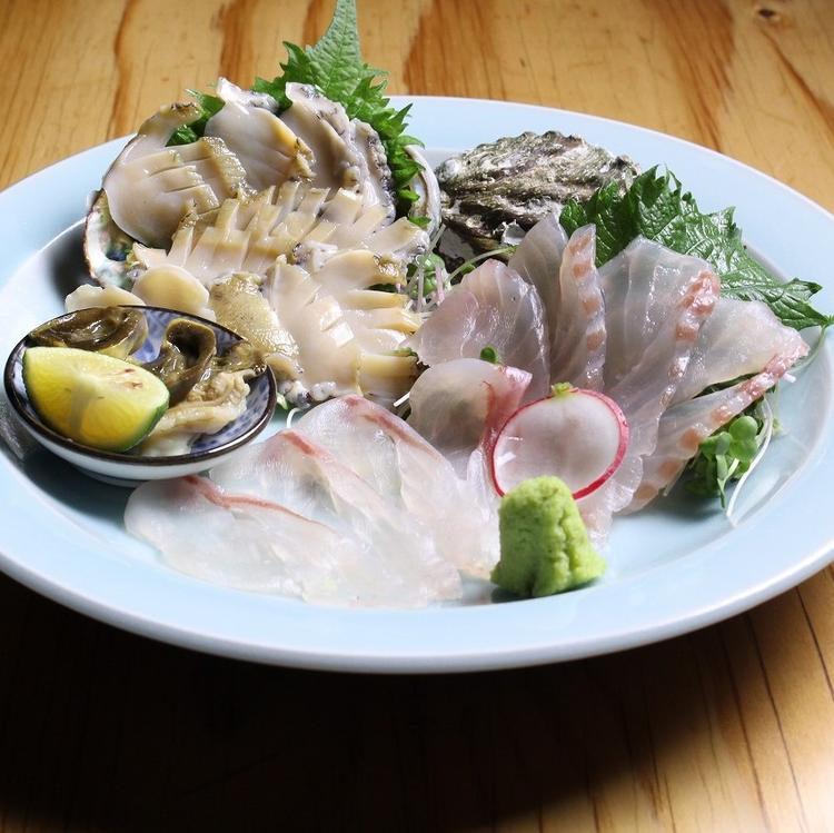 名物のクエとアワビの造り1,980円
