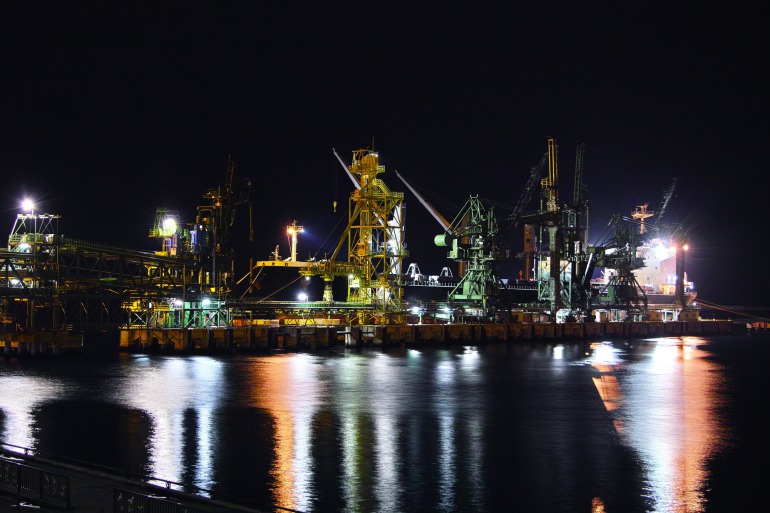 The night view of the factories by the port