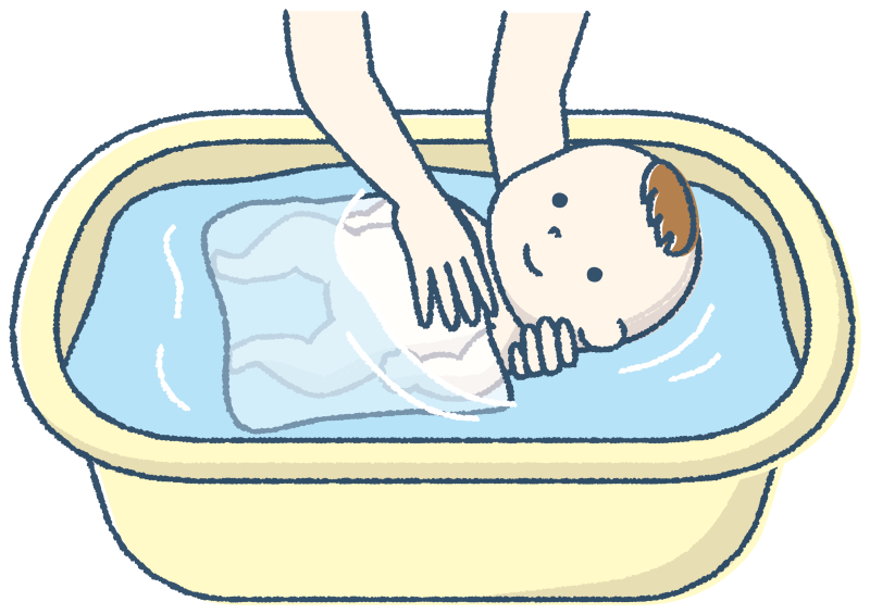沐浴布に包み、足先からお湯につけていく