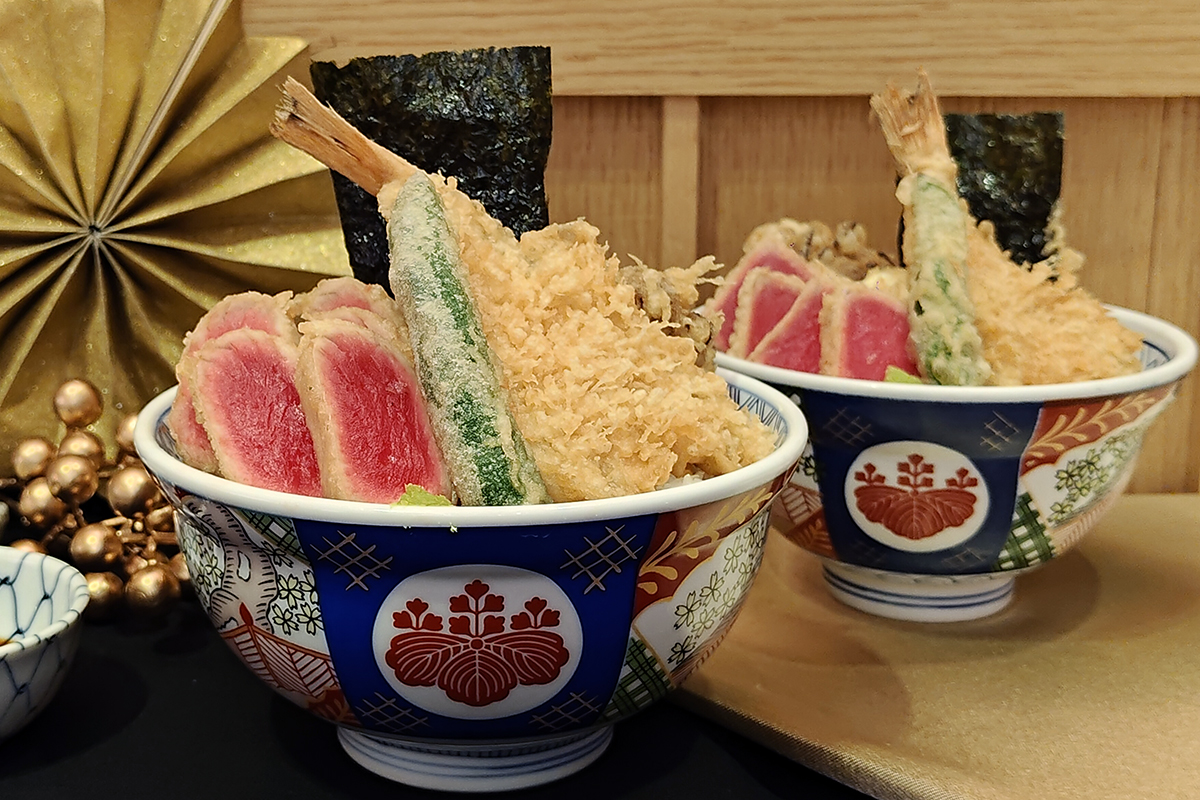 《金子半之助》推出新菜「生鮪揚天丼」,厚切鮪魚外酥、內嫩,視覺味覺雙饗宴。(示意圖)