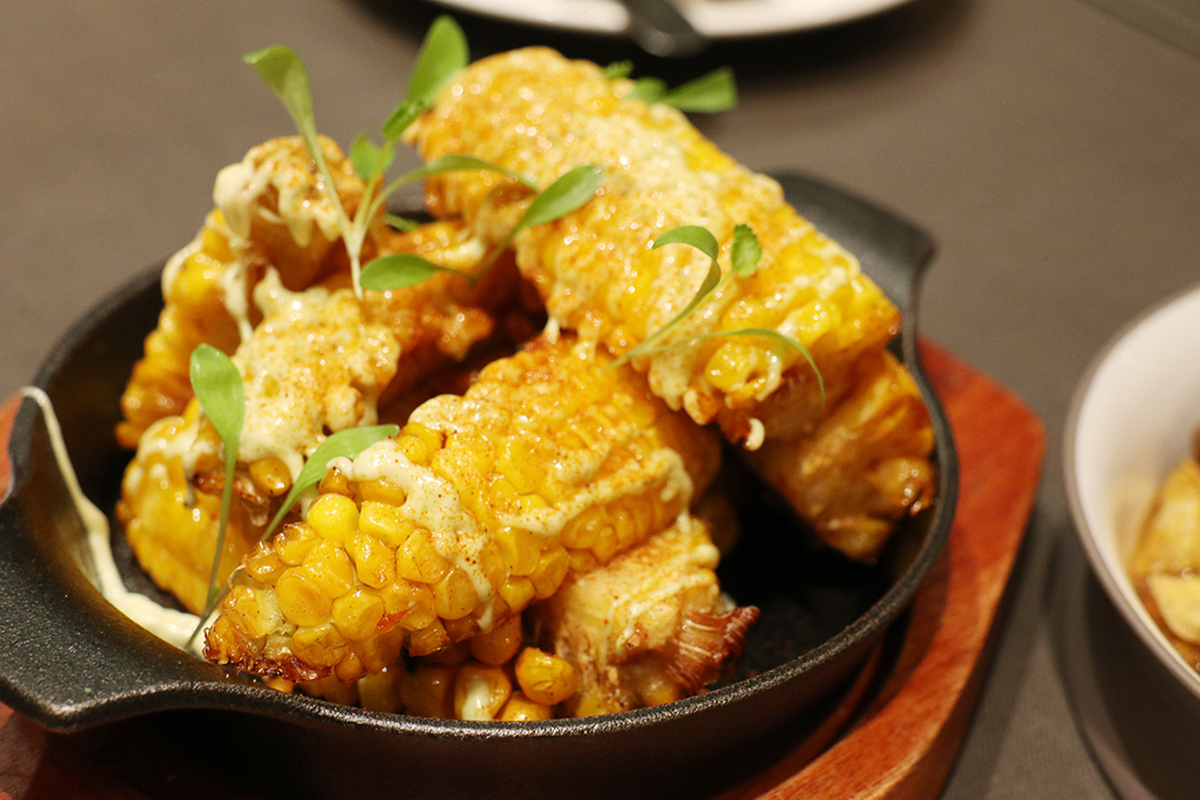 有菜單／慕舍酒店空中酒廊香辣起司烤玉米。（示意圖提供）